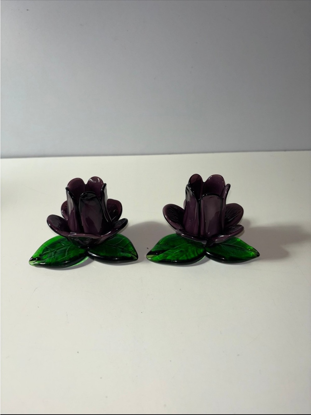 pair of purple art glass tulip shaped tea light and votive candle holders